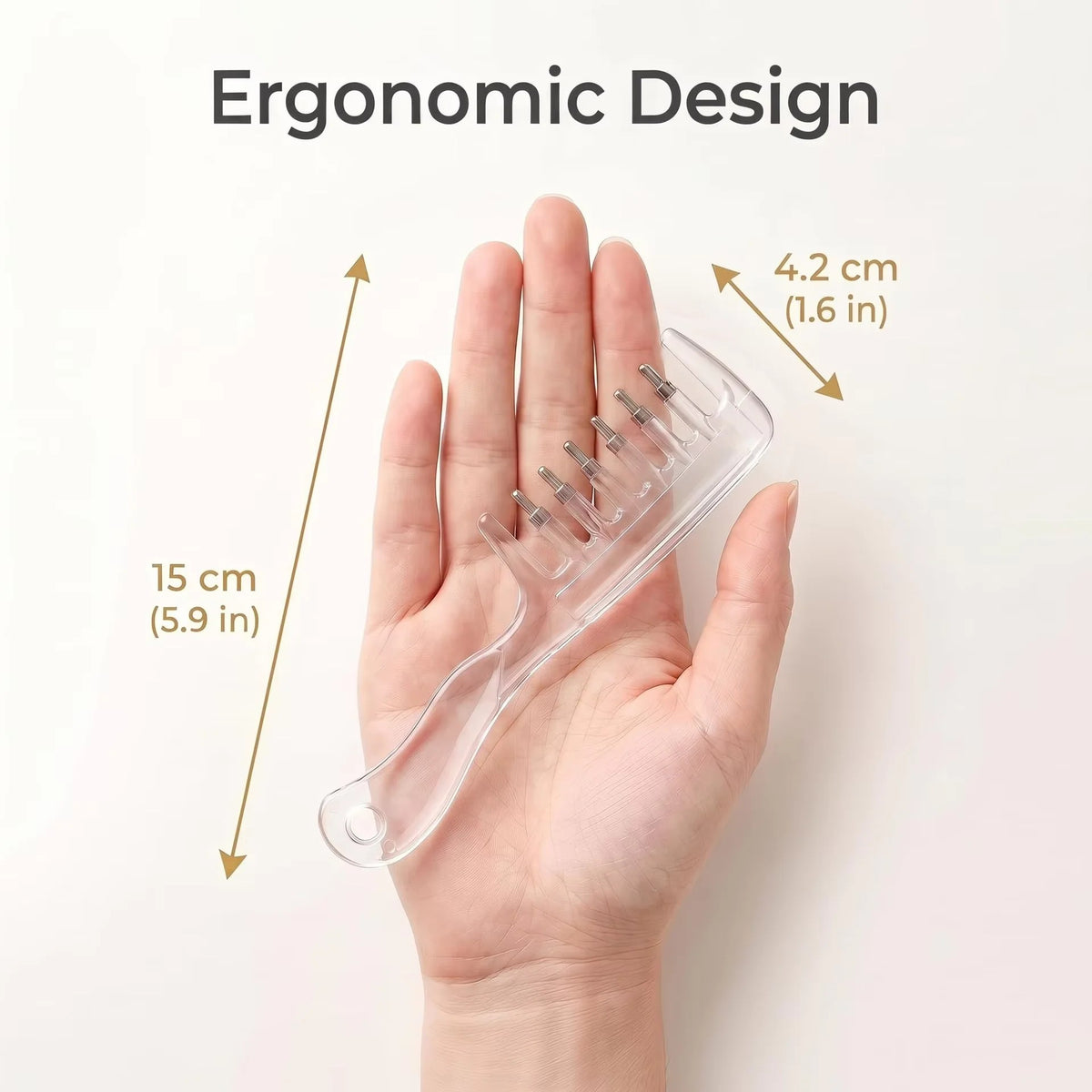 Comb shown in the hand for scale